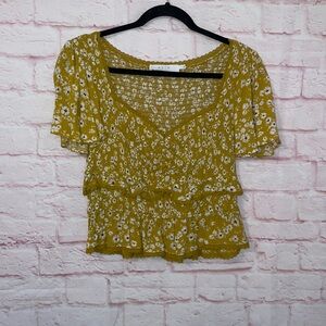 ASTR “mustard daisy” large crop top